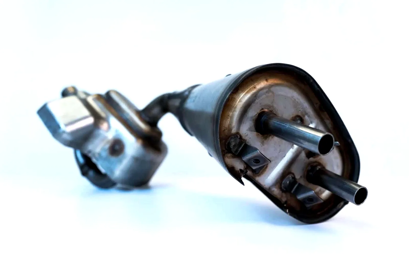 Muffler with welded exhaust flange assembly